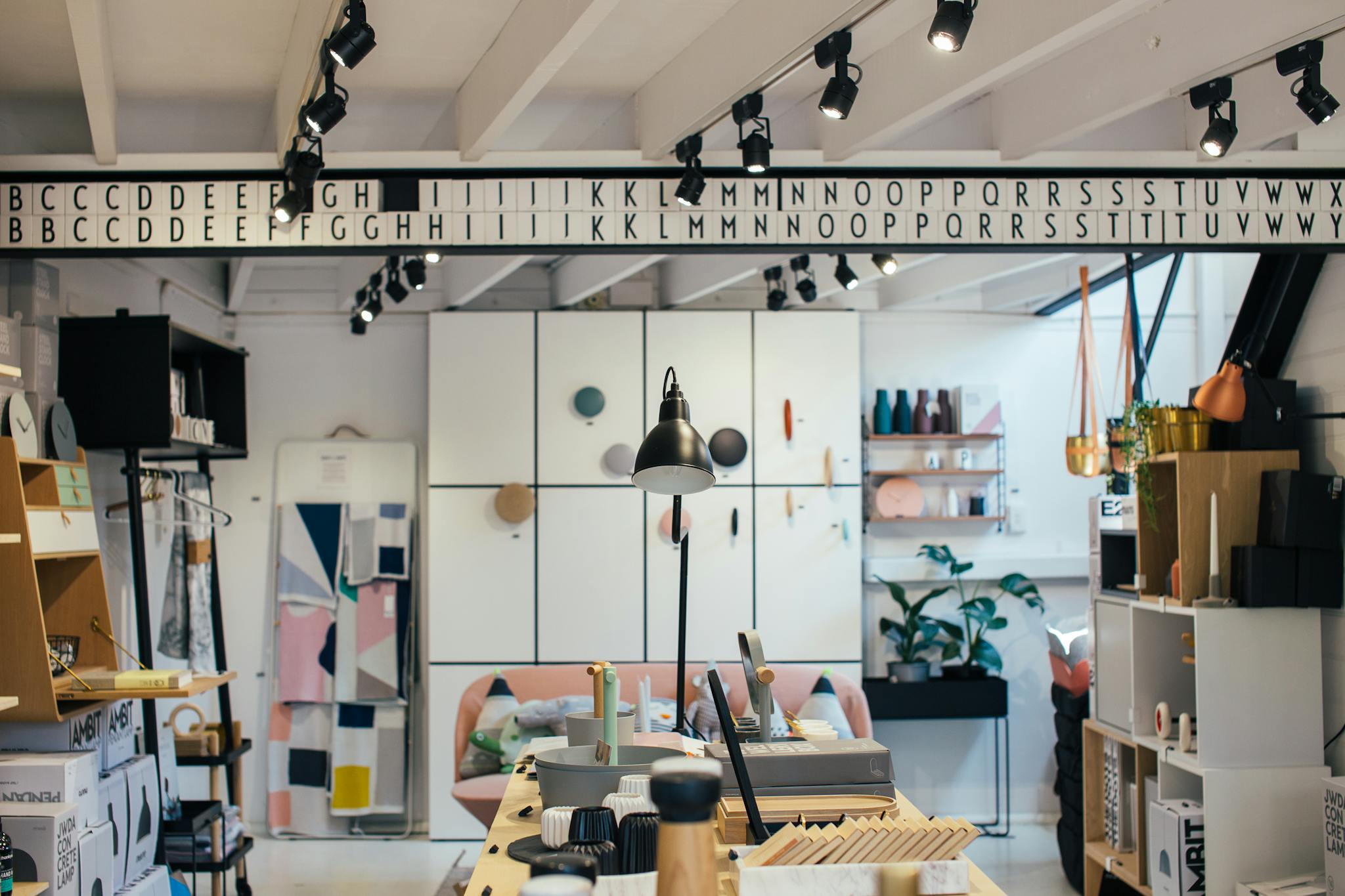 Explore a contemporary retail store interior featuring stylish decor and modern furniture arrangements.